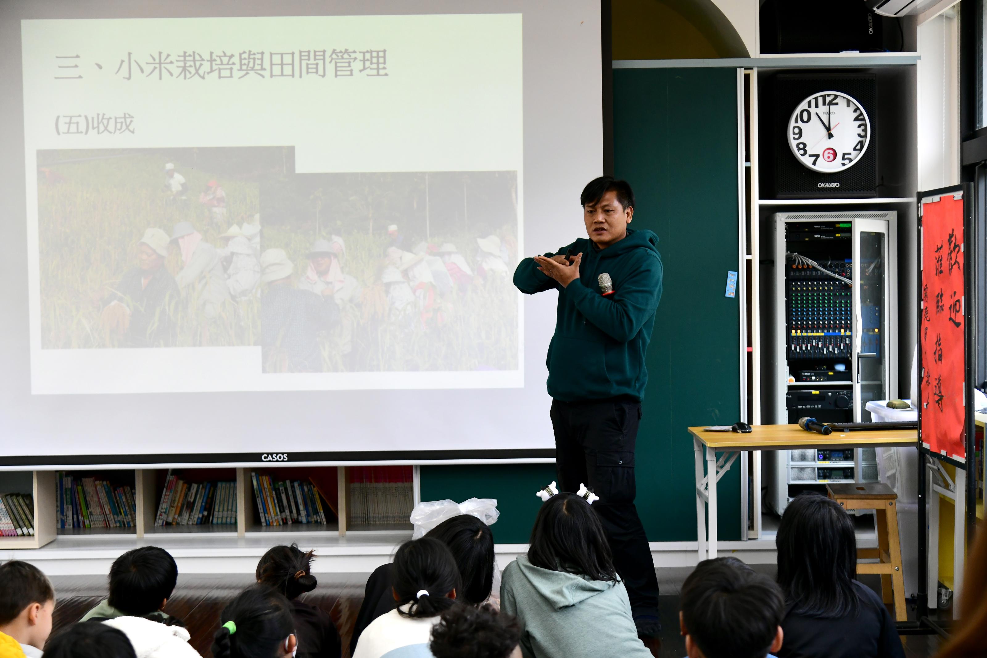 The instructor talks about millet growing and field management.